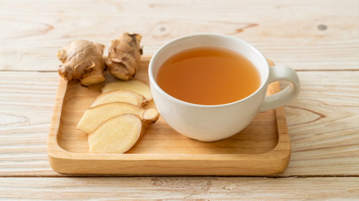 fresh-hot-ginger-juice-glass-with-ginger-roots-healthy-drink-style